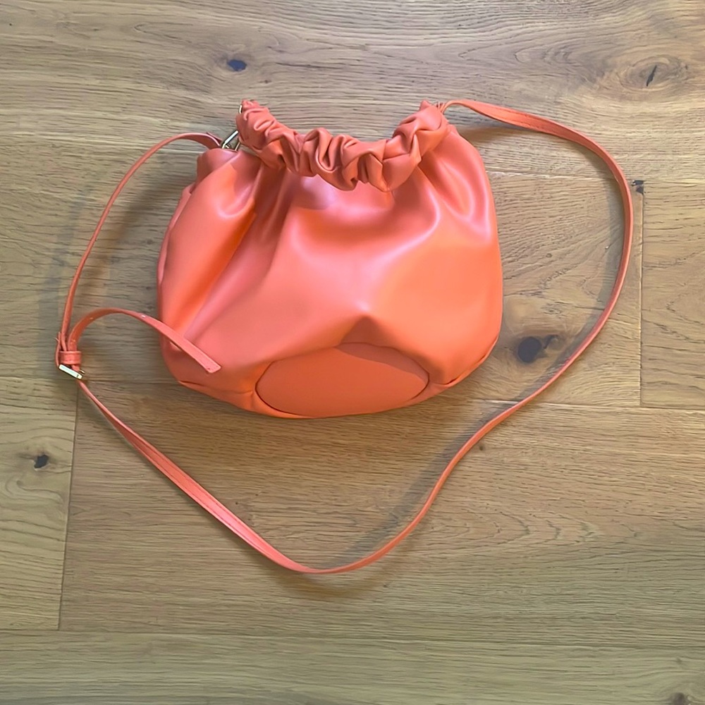 Orange bag used only once.